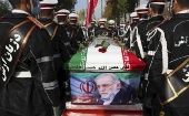 Coffin with the photograph of scientist Mohsen Fakhrizadeh, Iran, 2020.