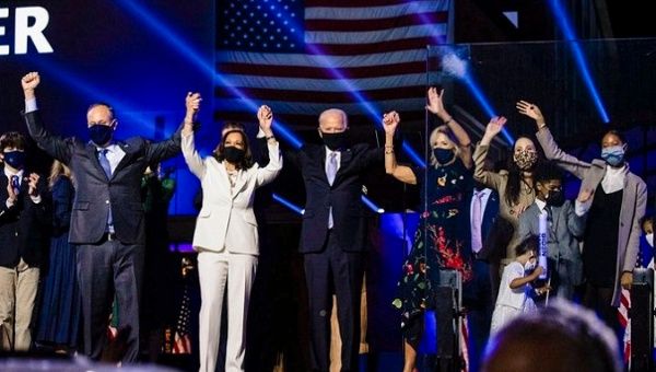 President-elect Joe Biden (C) and his team celebrate victory, U.S., 2020.