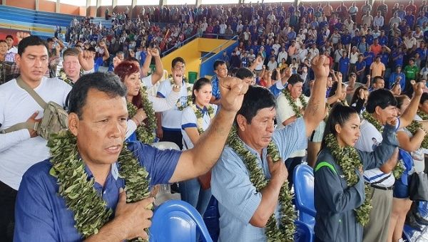 Cochabamba agricultural workers chant national anthem, Shinahota, Bolivia, Dec. 26, 2020.