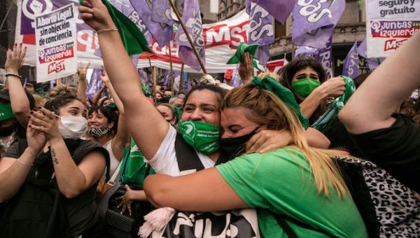 Women celebrate Senate' s decision to pass Safe Abortion Law, Buenos Aires, Dec. 30, 2020.
