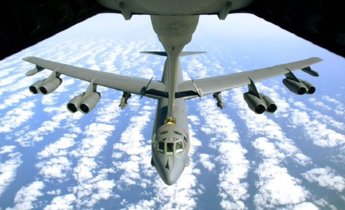 Image of a B-52 bomber taken from another plane.