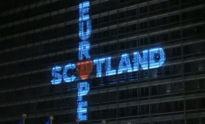 Image projected on the side of the European Commission headquarters, Brussels, Belgium, Dec. 31, 2020.