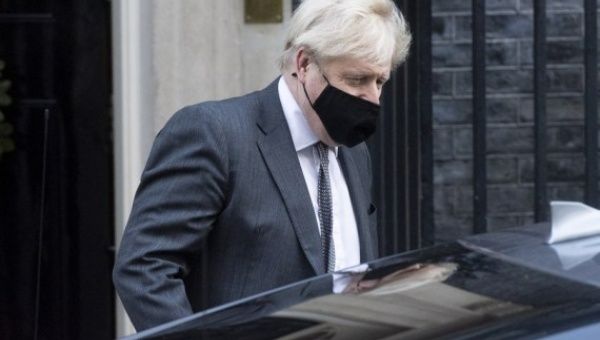 British Prime Minister Boris Johnson leaves 10 Downing Street for the House of Commons in London, Britain, on Dec. 30, 2020.