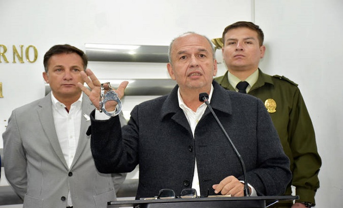 The then-Interior Minister Arturo Murillo shows the handcuffs he was supposed to put on Evo Morales if the leader returned to Bolivia. La Paz, Nov. 25, 2019.
