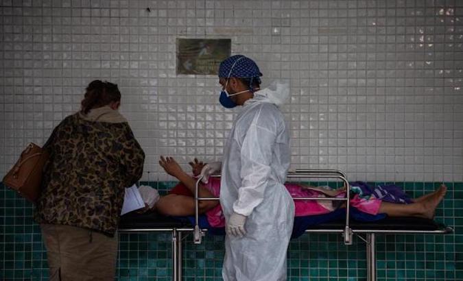 A patient awaits medical attention in Manaus, Brazil, Jan. 18, 2021.