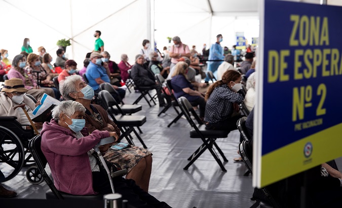 Elder people wait to receive the Chinese Sinovac COVID-19 vaccine, Santiago, Chile, Feb. 3, 2021.