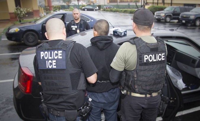 Immigration and Customs Enforcement agents arrest an immigrant, California, US , June. 14, 2020.