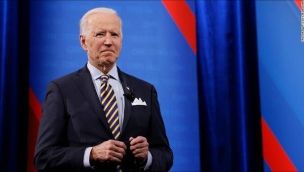 Biden says life in the United States may be back to 