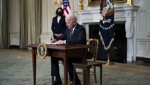 Joe Biden has revoked a series of executive orders and memos issued by Trump, affecting policies on financial regulation, immigration and funding for so-called “anarchist” cities. 