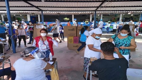 Voters attend Herminia Martinez polling center, Mejicanos, El Salvador, Feb. 28, 2021.