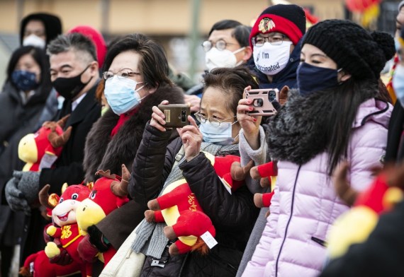 People take photos during an event to celebrate the upcoming Chinese Lunar New Year which falls on Feb. 12 in Chicago, the United States, Feb. 6, 2021.