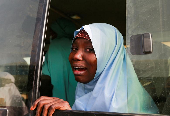 A rescued schoolgirl, among 279 girls kidnapped from the Jangebe Government Girls Science Secondary School, reacts after arriving home after the five-day ordeal in Jangebe, Zamfara, Nigeria March 3, 2021.
