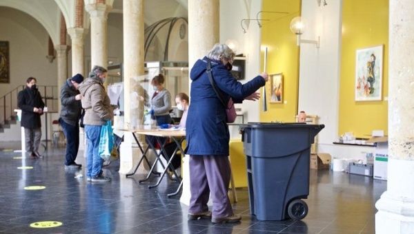 People register to vote at a polling station in Haarlem, the Netherlands, March 15, 2021.