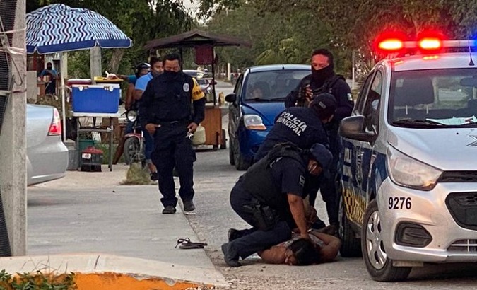 Image of Victoria Salazar during her arrest, Tulum, Mexico, March 27, 2021.