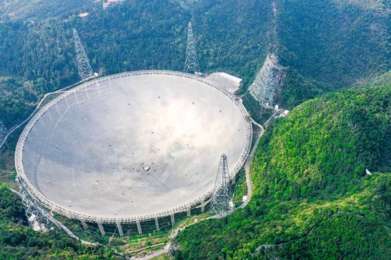 Aerial photo taken on March 28, 2021 shows China's Five-hundred-meter Aperture Spherical radio Telescope (FAST) under maintenance in southwest China's Guizhou Province.