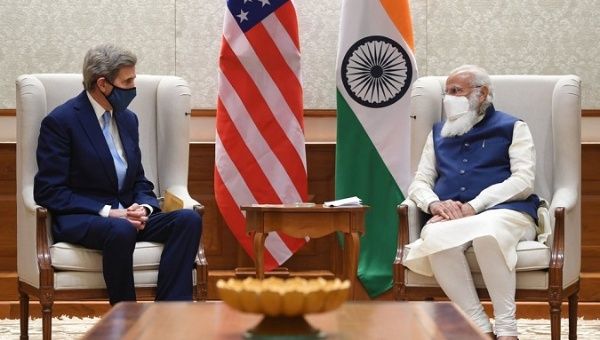 India's Prime Minister Narendra Modi and the U.S. Special Presidential Envoy on Climate John Kerry meet in New Delhi on April 7, 2021.