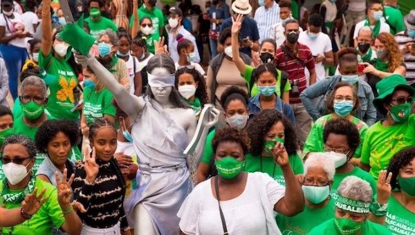 Women's rights advocates take to the streets of Santo Domingo, Dominican Republic, April 16, 2021.