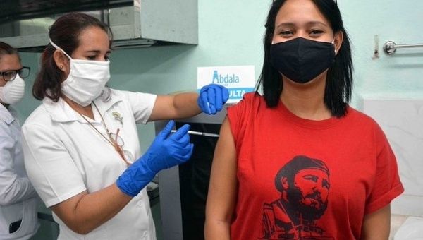 A woman gets a shot of the Abdala vaccine, Cuba, April 2021.