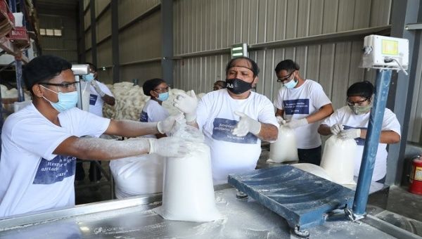 Workers prepare food packages for vulnerable families, Nicaragua, April. 20, 2021