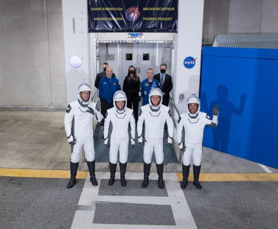 Astronauts pose for a group photo before they board the Crew Dragon spacecraft at NASA's Kennedy Space Center in Cape Canaveral of Florida, the United States, April 23, 2021.