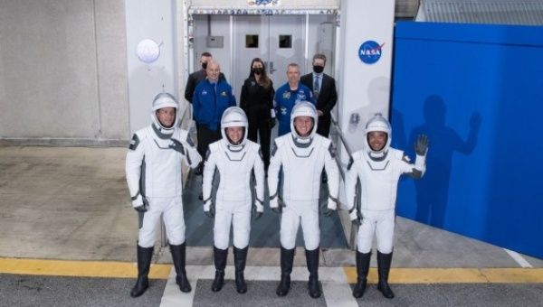 Astronauts pose for a group photo before they board the Crew Dragon spacecraft at NASA's Kennedy Space Center in Cape Canaveral of Florida, the United States, April 23, 2021.