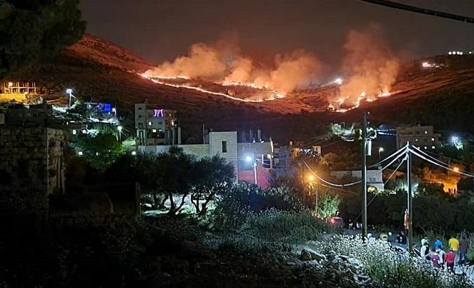 Palestinian properties in Burin village set on fire by Israeli settlers, May 4, 2021.