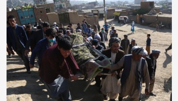Relatives and friends carry the coffin of a victim of a car bomb attack in Kabul, capital of Afghanistan, May 9, 2021.