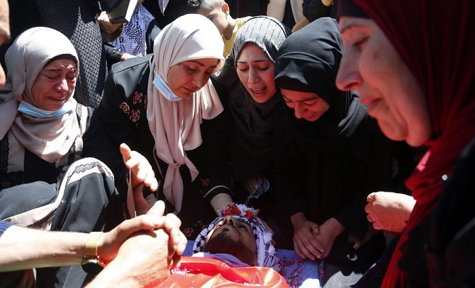 Funeral of Palestinian Yassin Hamad, 25, in Nablus, West Bank, May 16, 2021.