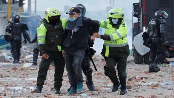 Police arrest a man in Bogota, Colombia, May 2021.