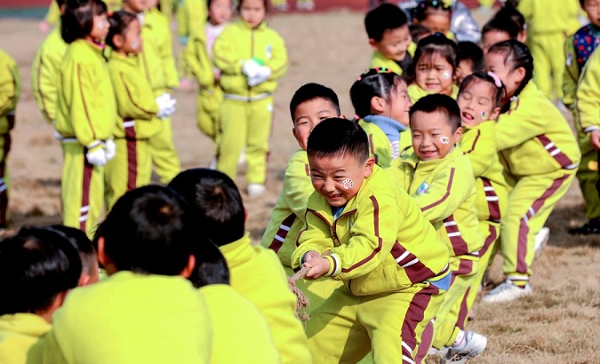Children take part in the tug-of-war game, Huzhou City, China, Dec. 25, 2020.