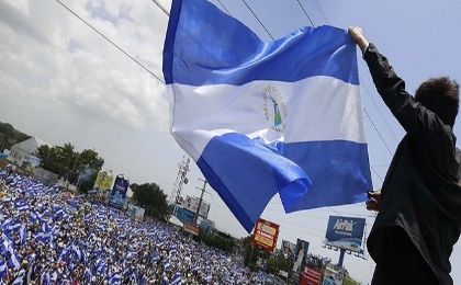 People gathered during a sandinist political meeting in Managua, Nicaragua, June 12, 2021.