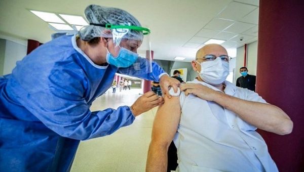A nurse vaccinates a citizen, Buenos Aires, Argentina, Jun. 25, 2021.