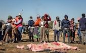 Family members grieve over the death of the victims of the protests, Johannesburg, South Africa, July 14, 2021. 