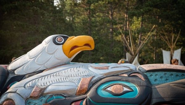 The Totem, a sacred symbol, will remain outside the National Museum of the American Indian.