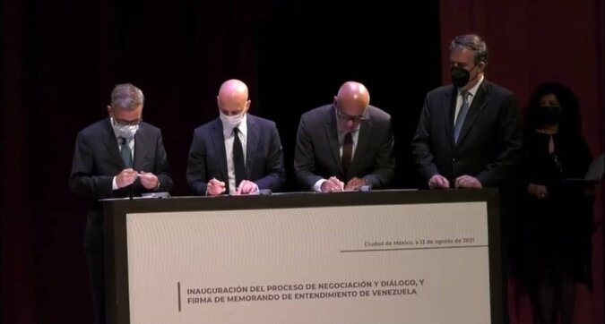 The Government of Venezuela and the opposition (United Platform) sign a memorandum of understanding to begin the political negotiations in Mexico City, Mexico. August 13, 2021.