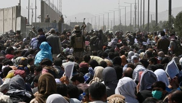 The perimeter of Kabul's airport continues crowded with thousands of Afghans seeking to escape the Taliban.