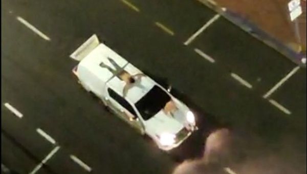 Social media flooded with the images of some hostages strapped to the top of getaway cars being used as human shields by the criminals.