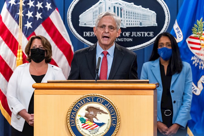 Attorney General Merrick Garland (C), along with Deputy Attorney General Lisa Monaco (L), and Associate Attorney General Vanita Gupta (R), announces a lawsuit against Texas and its new abortion law, which is the most restrictive in the country, at the Department of Justice in Washington