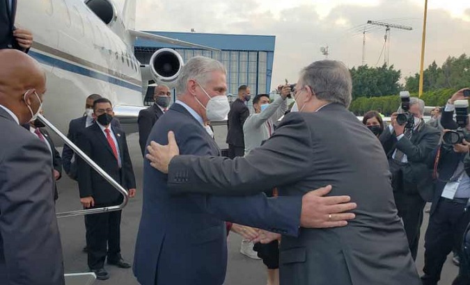 Mexico's Foreign Affairs Minister Marcelo Ebrad (R) welcomes Cuba's President Miguel Diaz-Canel (L), Sept. 16, 2021.