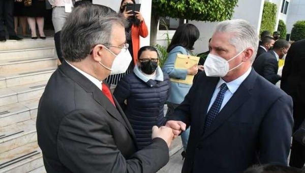 Mexican Foreign Minister Marcelo Ebrard (L) and Cuba's President Miguel Diaz-Canel (R), Mexico City, Sept. 16, 2021.