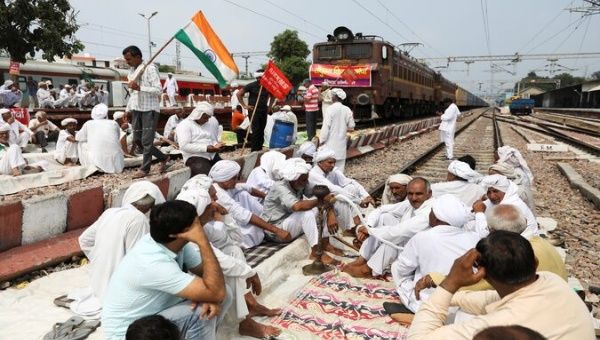Indian farmers blocking a railroad, India, Sept. 27, 2021.