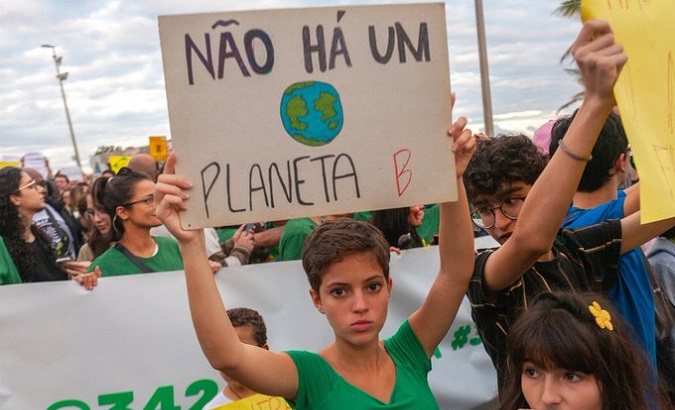 The sign reads, “There is no Planet B”, Rio de Janeiro, Brazil.