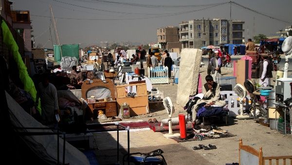 Photo taken on Oct. 13, 2021 shows a second-hand market in Kabul, capital of Afghanistan. Since Taliban's takeover of the country in mid-August, growing poverty and unemployment in cash-strapped Afghanistan have given rise to the business of trading second-hand home appliances and goods.