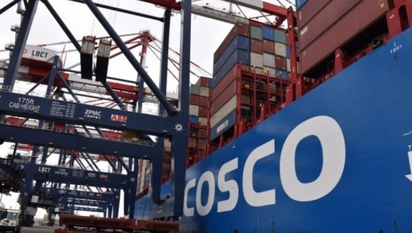 A container ship of China's COSCO Shipping docks at a new container terminal of the Port of Long Beach in California, the United States, Aug. 20, 2021.