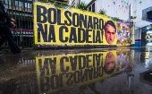 The sign reads, "Bolsonaro, go to jail!", Sao Paulo, Brazil, Oct. 26, 2021.