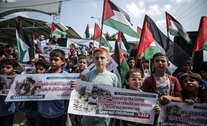 Palestinian children at a rally in defense of their rights.