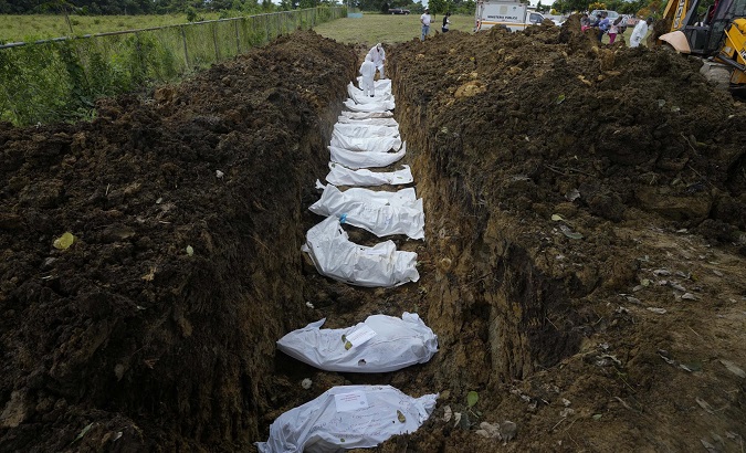 Officials bury 15 unknown migrants, Panama, Sept. 30, 2021