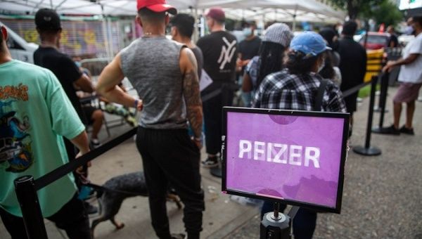 People wait in line to receive the Pfizer vaccine, NYC, U.S., Aug. 23, 2021.