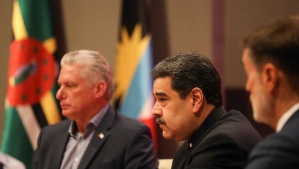 Venezuela's President Nicolas Maduro (C) and President Miguel Diaz-Canel (L), Havana, Cuba, Dec. 14, 2021.