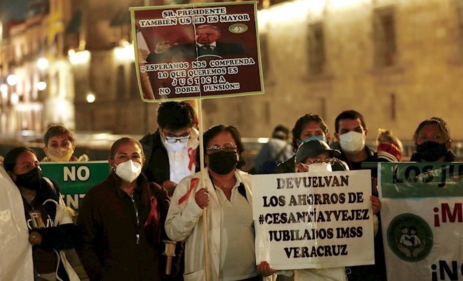 Retired health workers protest low pensions in Mexico City, Mexico, July 6, 2021.